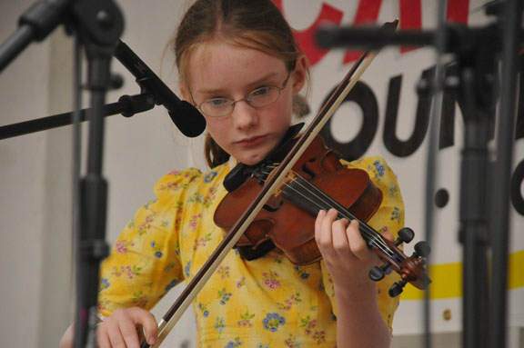 Rose playing fiddle.
